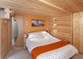 Porthole Log Cabin