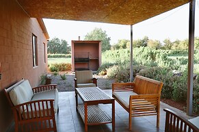 Peumayen Atacama / Hostal & Cabaña