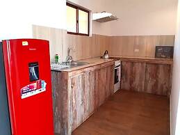 Peumayen Atacama / Hostal & Cabaña