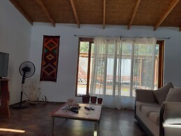 Peumayen Atacama / Hostal & Cabaña
