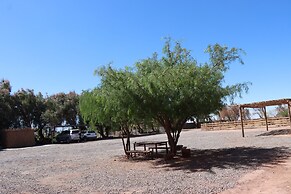 Peumayen Atacama / Hostal & Cabaña