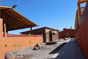 Peumayen Atacama / Hostal & Cabaña