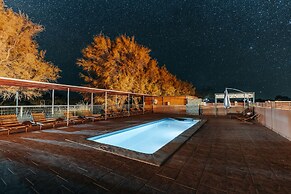 Peumayen Atacama / Hostal & Cabaña