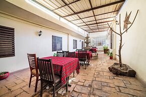 Capital O Hotel Casa Blanca