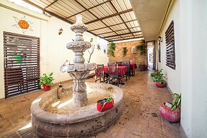 Capital O Hotel Casa Blanca