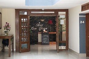 Capital O Hotel Casa Blanca