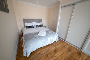 The Coach House by Riis Property