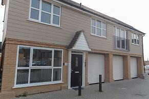 The Coach House by Riis Property