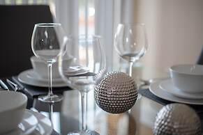 The Coach House by Riis Property