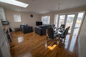 The Coach House by Riis Property