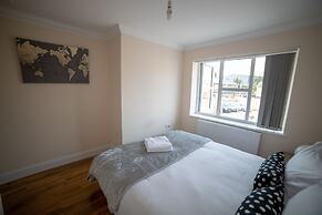 The Coach House by Riis Property