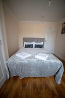 The Coach House by Riis Property