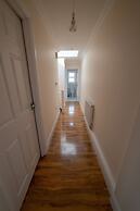 The Coach House by Riis Property