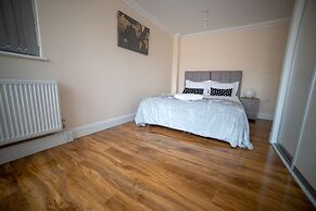 The Coach House by Riis Property