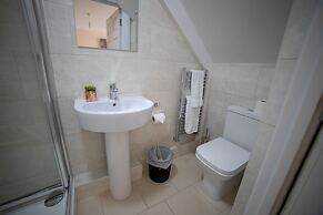 The Coach House by Riis Property