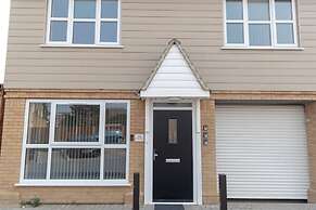 The Coach House by Riis Property