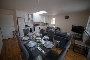 The Coach House by Riis Property