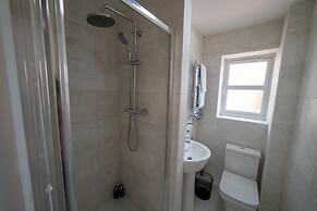 The Coach House by Riis Property