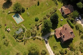 Casale Chimneys Immersed in Olive Trees