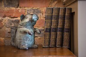 The Curious Pig in the Parlour