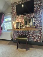 The Curious Pig in the Parlour