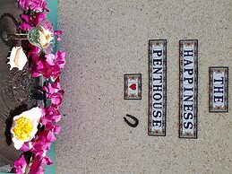 The Happiness Penthouse