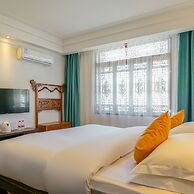 Floral Hotel Mi Yu Inn Lijiang