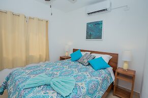 Bella Caribbean 2 Bedroom Condo by Redawning