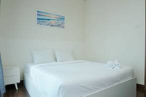 Minimalist and Relaxing 1BR Apartment at Puri Orchard