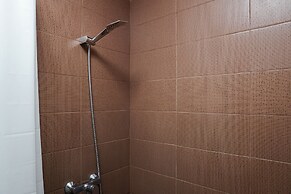 Minimalist and Relaxing 1BR Apartment at Puri Orchard