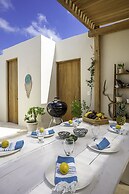 Calalily Aldea Zama by Homing Bird