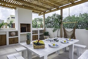 Calalily Aldea Zama by Homing Bird