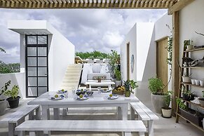Calalily Aldea Zama by Homing Bird