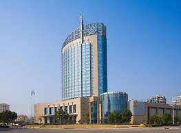 Huaqiao New Century Grand Hotel