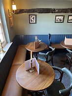 The Plume of Feathers