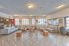 Cavos Bay Hotel and Studios