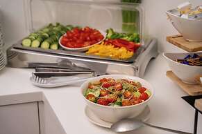 Escala Hotel & Suites