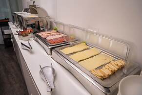 Escala Hotel & Suites