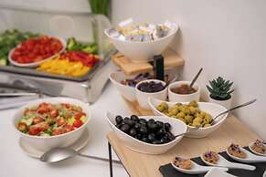 Escala Hotel & Suites