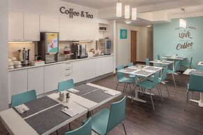 Escala Hotel & Suites