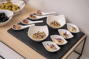 Escala Hotel & Suites