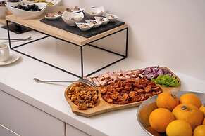 Escala Hotel & Suites