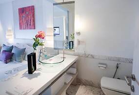 The Ashtan Sarovar Portico Delhi