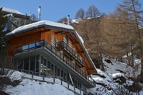 Mountain Exposure Luxury Chalets & Penthouses & Apartments