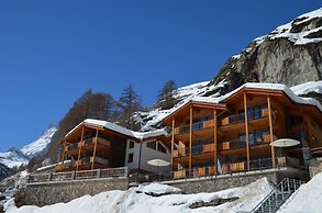 Mountain Exposure Luxury Chalets & Penthouses & Apartments