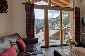Mountain Exposure Luxury Chalets & Penthouses & Apartments