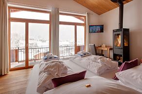 Mountain Exposure Luxury Chalets & Penthouses & Apartments