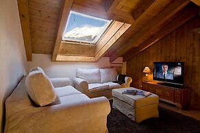 Mountain Exposure Luxury Chalets & Penthouses & Apartments