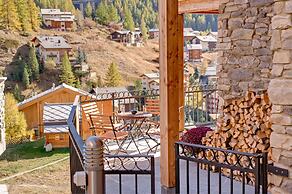 Mountain Exposure Luxury Chalets & Penthouses & Apartments