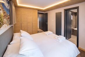 Mountain Exposure Luxury Chalets & Penthouses & Apartments